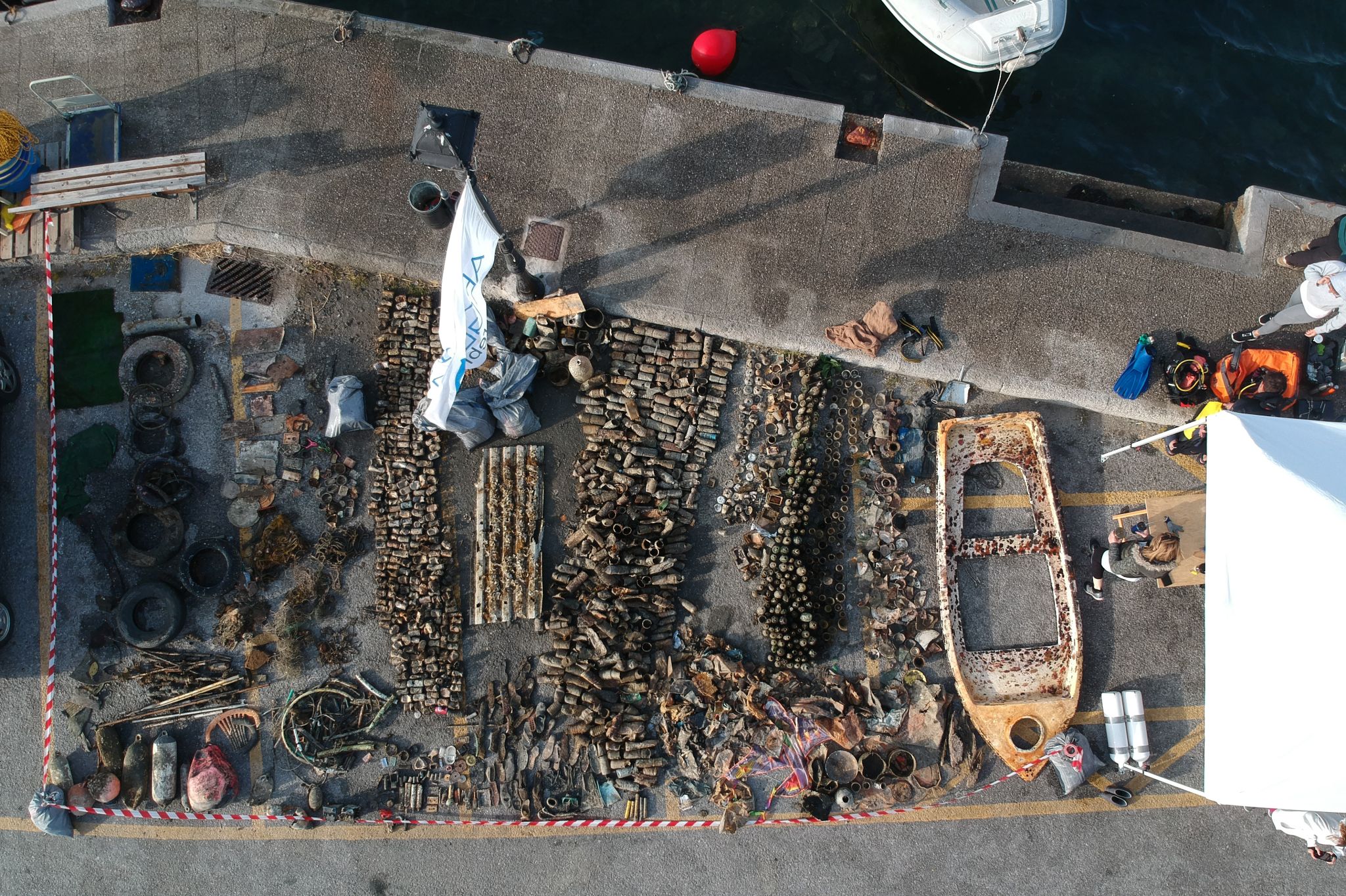 Aerial view of a collection of trash near the beach.
