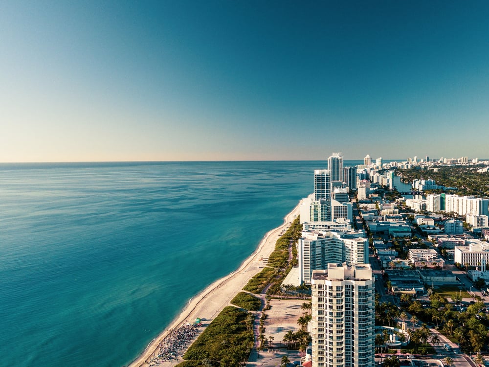miami skyline next to ocean